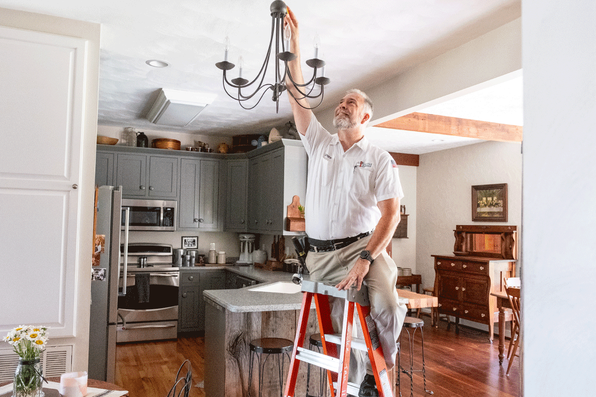 Wisler master electrician adding a light fixture.