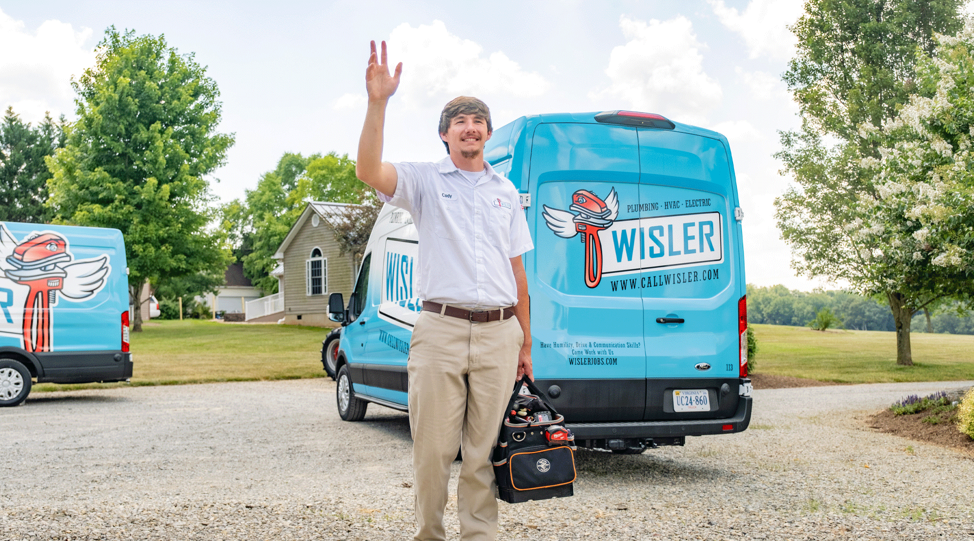 Wisler AC technician waiving hello.