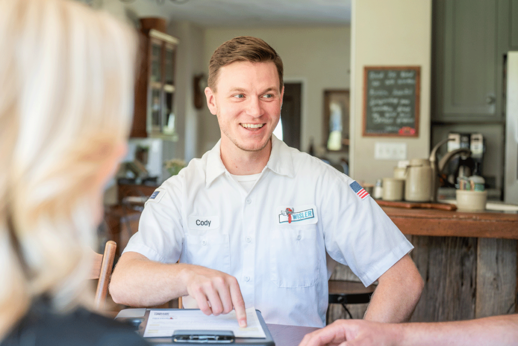 Wisler technician going over financing options.