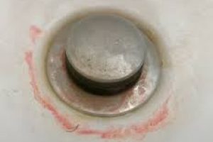 What Are The Pink Stains In My Shower, Sink And Toilet?